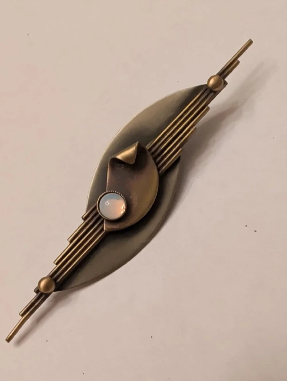 Vintage-Inspired Bronze Bar Brooch with Opalescent Cabochon